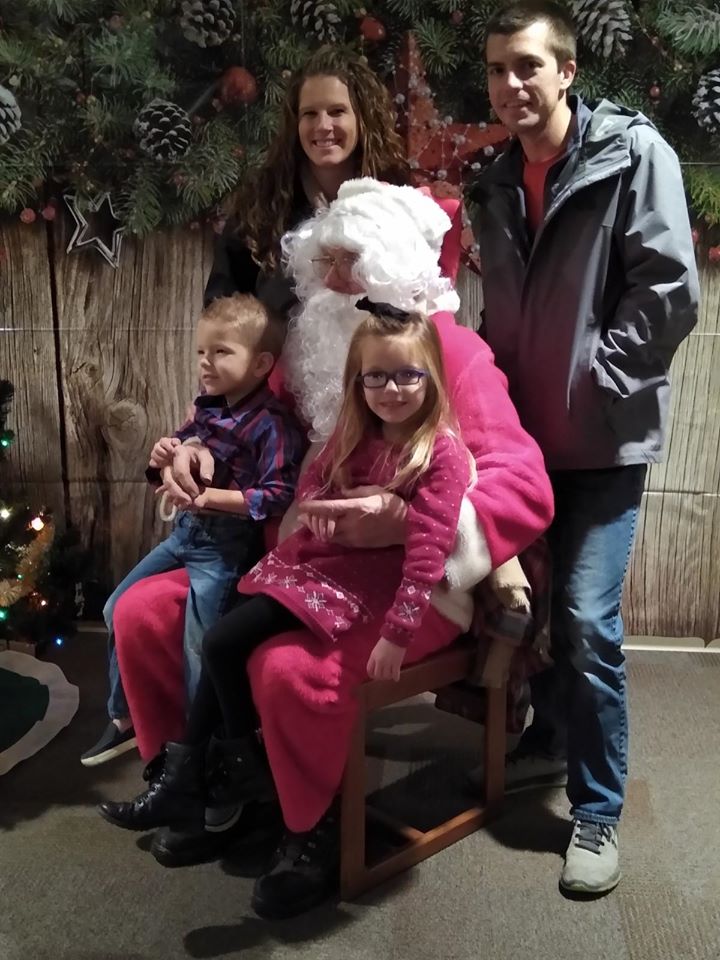 Santa visiting with families