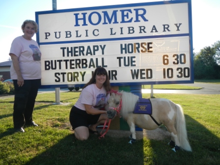 butterball in front of the library sign